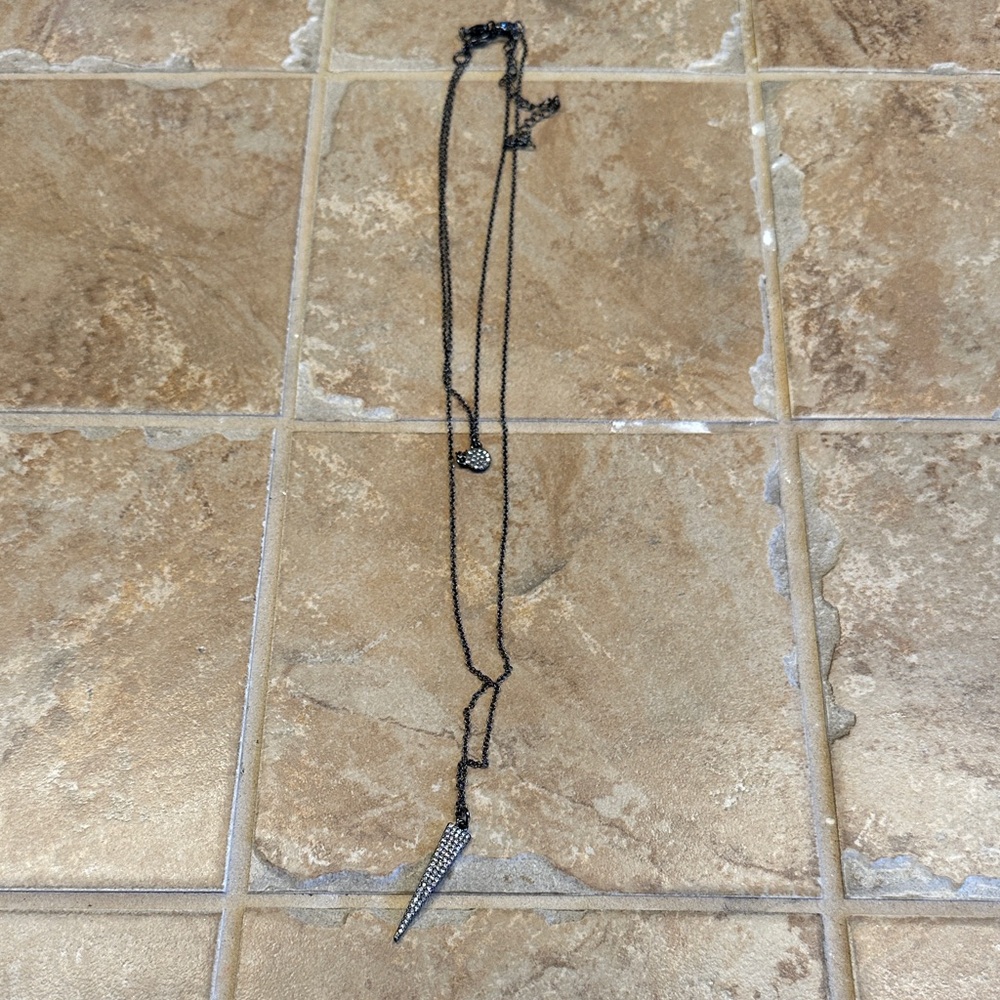 Black Beaded Necklace with Silver Pendant
